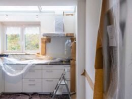 kitchen undergoing home renovation with protective plastic