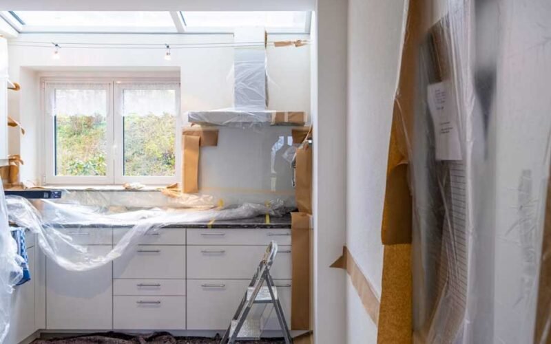 kitchen undergoing home renovation with protective plastic